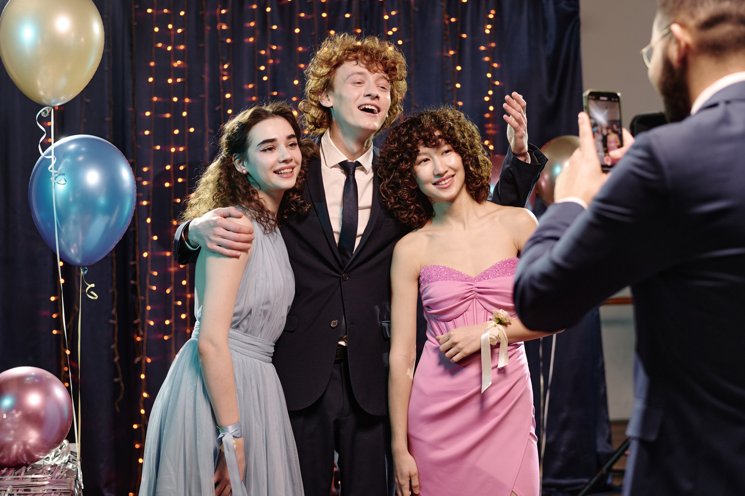 Group of students who are friends posing together for a photo at prom night at Lezar Opstal Heidelberg Gauteng